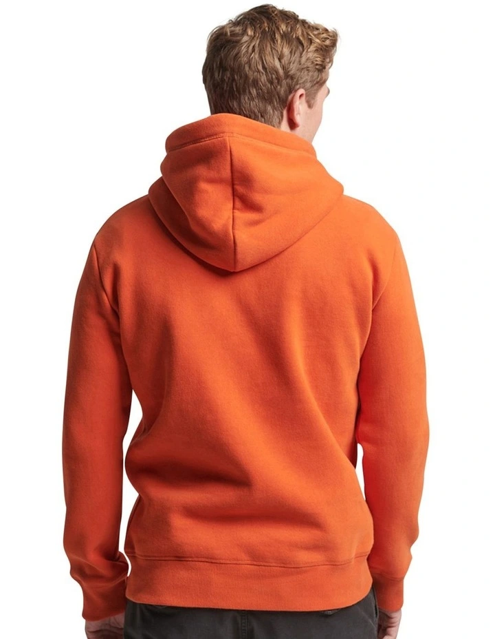 Essential Logo Hoodie in Denim Co Rust Orange