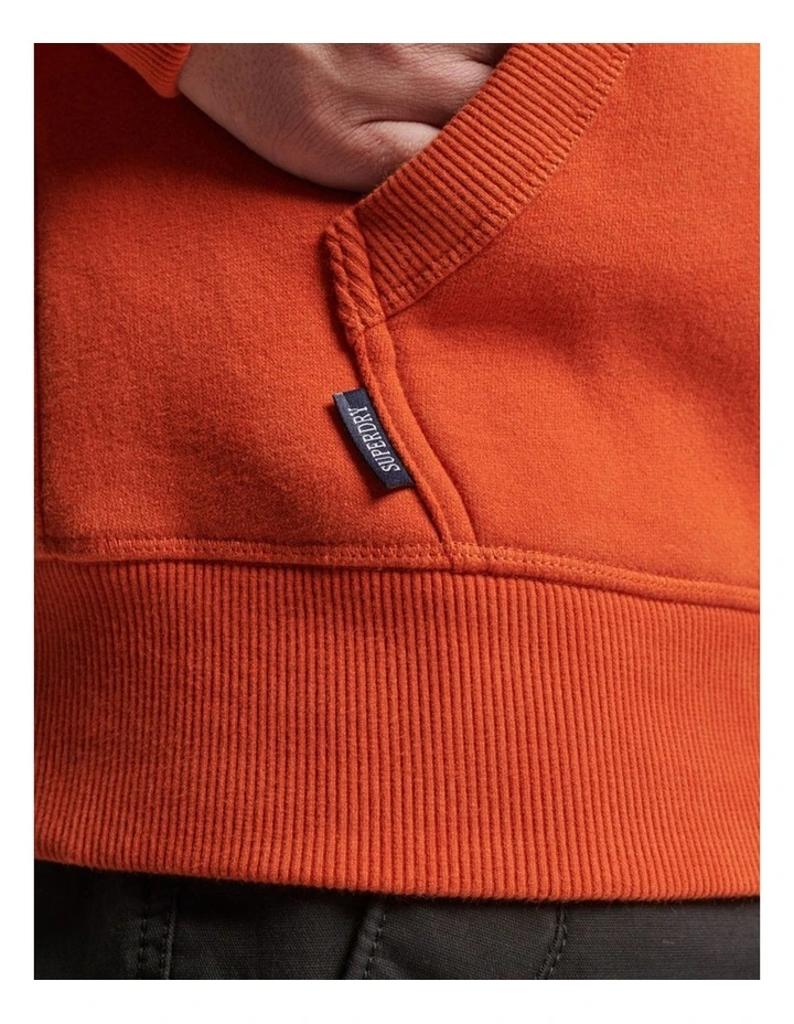 Essential Logo Hoodie in Denim Co Rust Orange