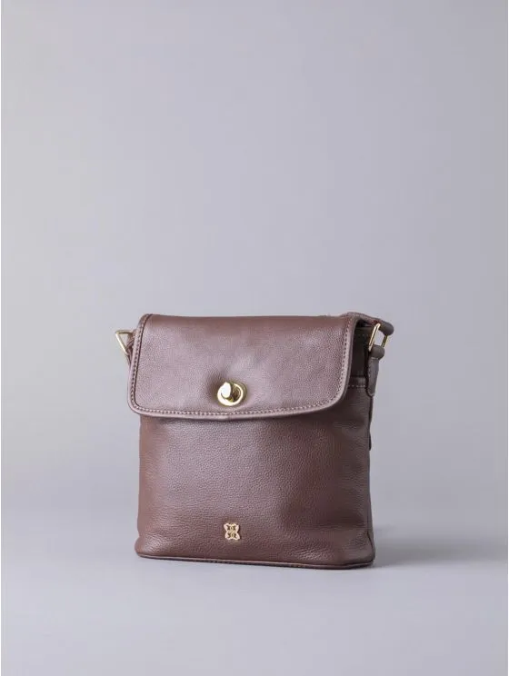 Rickerlea Leather Turn Lock Cross Body Bag in Brown