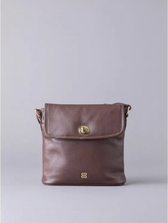 Rickerlea Leather Turn Lock Cross Body Bag in Brown